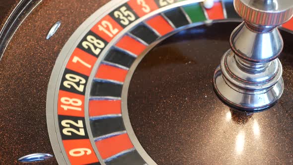 Ball on Roulette Table in Casino