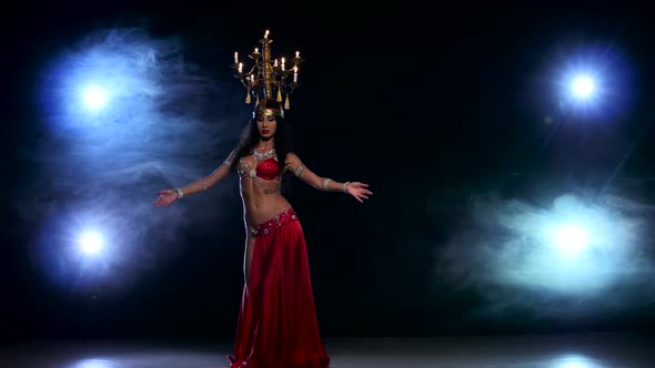 Attractive Belly Dancer Girl Starts Dancing with Candles on Her Head, Black, Smoke alt