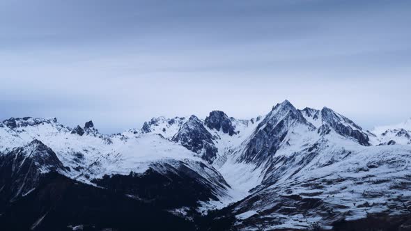 Winter in the Alps Mountains, Moving Clouds before Storm