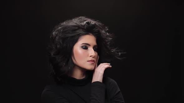 Beautiful Girl Looking at Camera in Studio