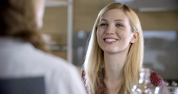 Blonde Woman Talking and Laughing Detail alt