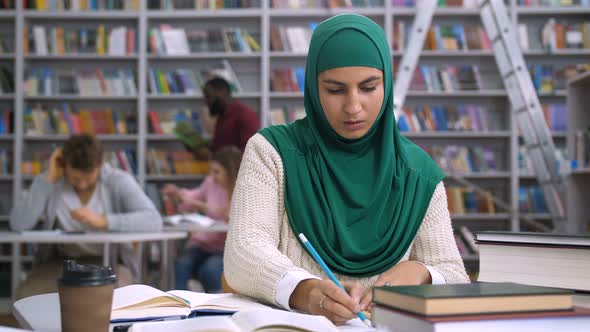 Muslim Architect Student Working with Sketch alt