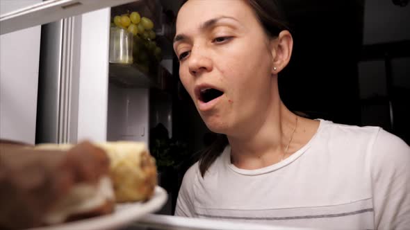 Dieting woman resisting temptation to eat dessert