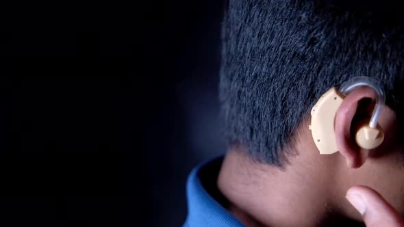 Hearing Aid Concept a Young Man with Hearing Problems alt