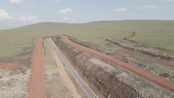 Moving along railroad tracks. Aerial view of Railroad emergency stop track in Trialeti, Georgia alt