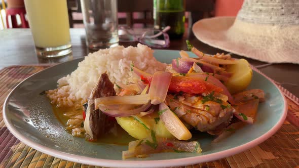 Sudado De Pescado Traditional Peruvian Food in Cafe Seafood Plate on the Table