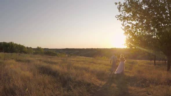 Wedding Photographer Takes Pictures of the Bride and Groom