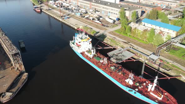 Cargo ship in port alt