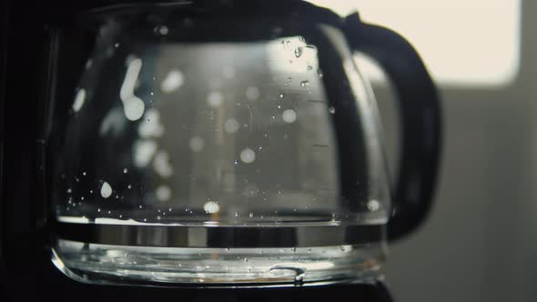 Fresh Coffee Dripping Into Pot alt