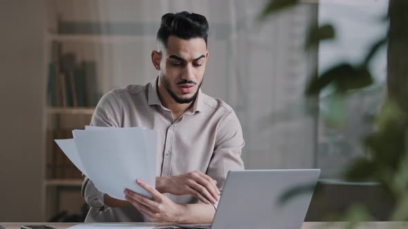 Upset Businessman Arab Guy Copy Paper Text at Computer Electronic Form Feel Nervous Frustrated alt