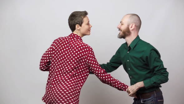 Swing dancers on white background. Man and woman are dancing