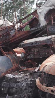 Vertical Video of Wardestroyed Cars in Ukraine alt