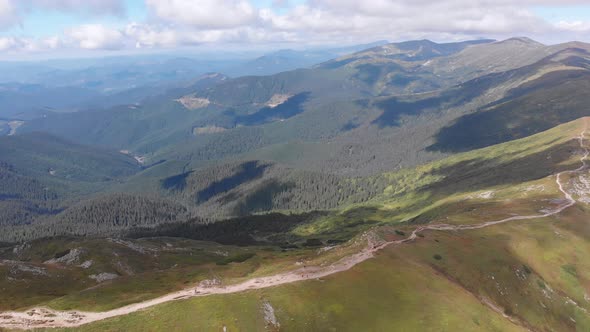 Aerial Panoramic View of Top of Carpathian Mountain Range with Trails. Hiking alt
