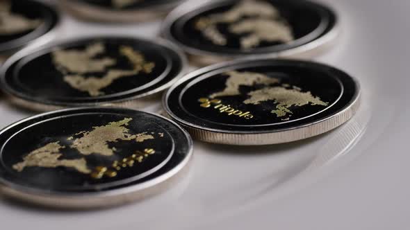 Rotating shot of Ripple Bitcoins (digital cryptocurrency) - BITCOIN RIPPLE alt
