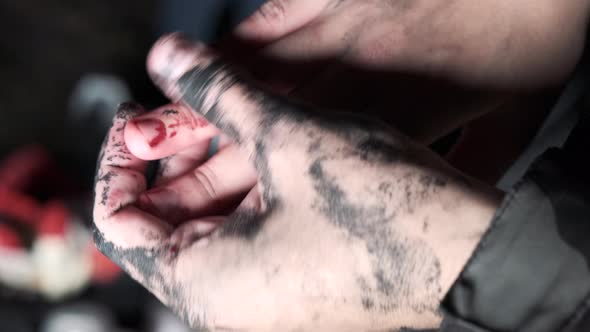 Closeup of Hands Stained with Paint alt