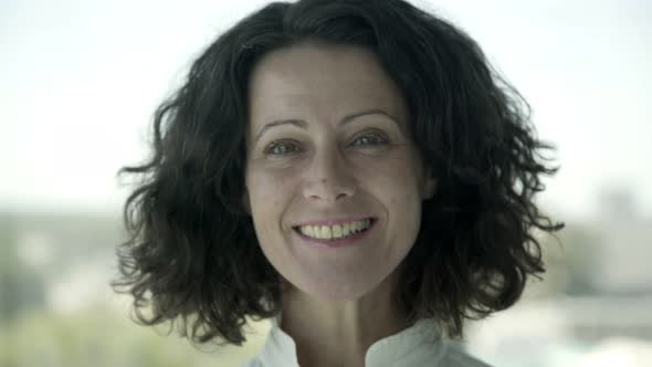 Cheerful Middle Aged Businesswoman alt