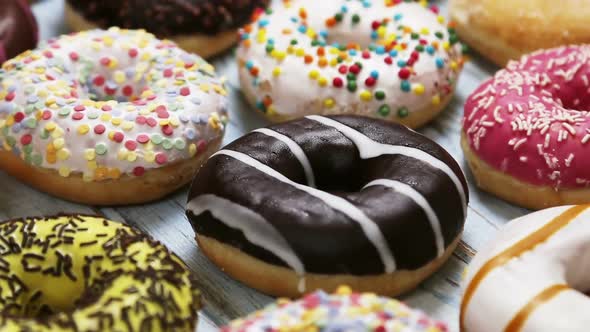 Assorted Donuts with Different Fillings and Icing