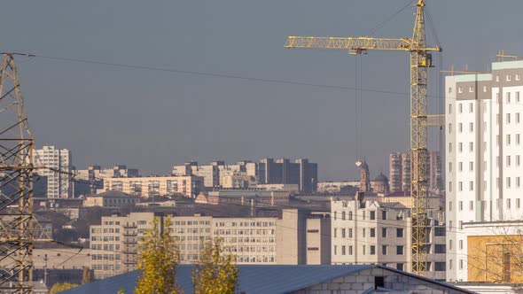 Crane and Building Construction Site in a Big City Aerial Timelapse alt