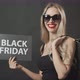 Happy Woman with Black Friday Posters - VideoHive Item for Sale