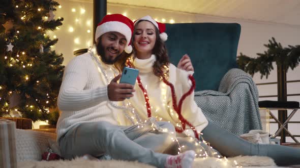 A Couple in Love Uses a Video Call alt