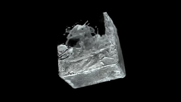 Cube With Water Spinning And Splashing On A Black Background