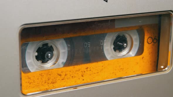 Tape Recorder Plays Audio Cassette Inserted Therein. Vintage Audio Tape alt