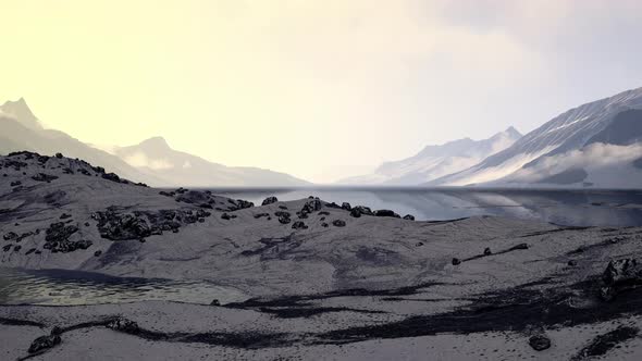 Beach with Big Round Stones on the Coast of the Barents Sea in Arctic alt