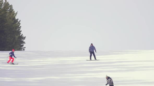 Tourists Relax at the Mountains Ski Resort alt