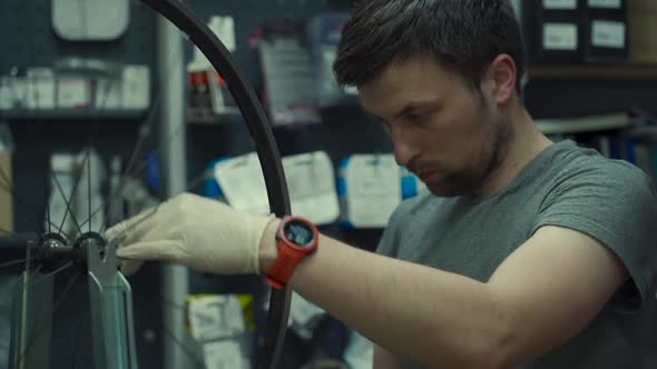 Wheel Straightening Stand in Bicycle Workshop alt