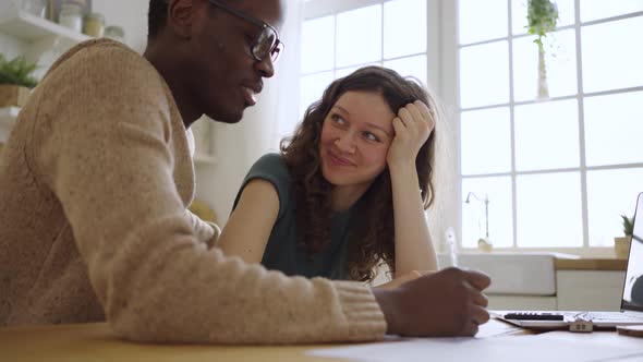 Black Realtor and Client Sign Contract of Apartment Purchase alt