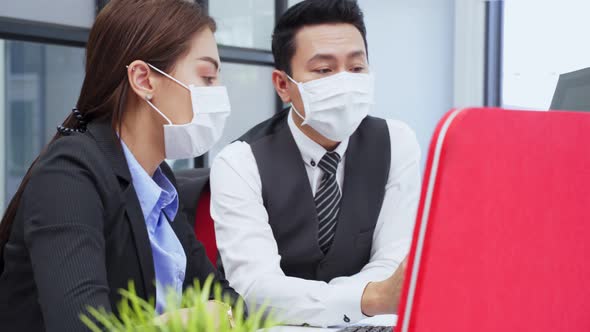Asian team business man and woman people wear face mask, work and meeting in office with new normal. alt