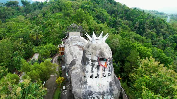 Aerial view of Chiken Church, a unique building on the hill of Rhema alt