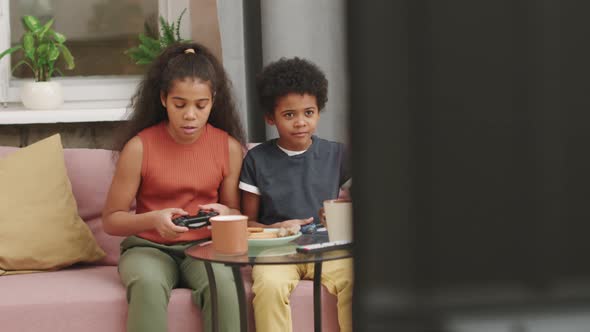 Afro Kids Playing Video Games alt