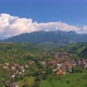 Aerial View above Small Village in Mountains - VideoHive Item for Sale