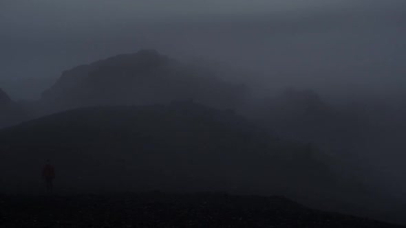 dramatic iceland landscape at night, camera movement, camera pan from right to left to reveal a pers alt