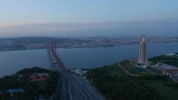 Wide Panoramic View of Lisbon Coast with City Center Monument of Santuario De Cristo Rei and Car alt