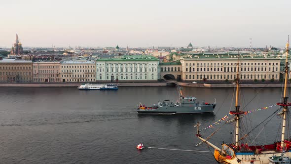 Aerial Landscape of a Modern Military Boat Goes Along the Palace Embankment at Early Morning a alt