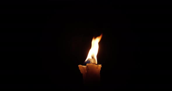 Burning Torch On A Black Background At Night