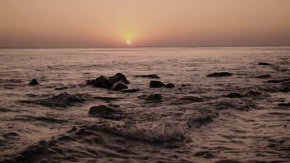  Lonely Wave on the Setting Sun