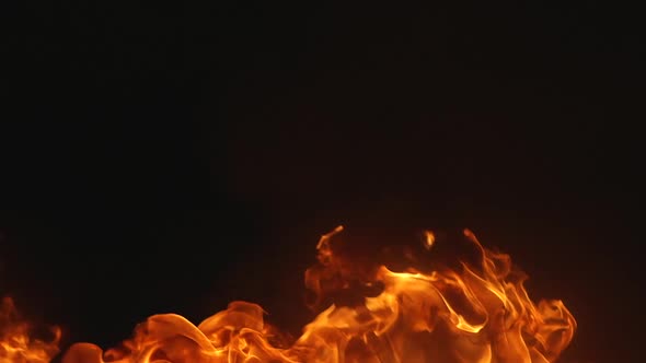 Burning loop of fire, heat and smoke on dark background. Mockup render texture. alt