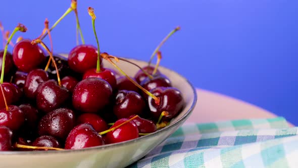 Fresh Juicy Red Cherry Berry Rotate on Plate