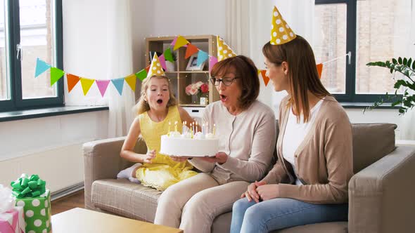 Mother, Daughter, Grandmother with Birthday Cake alt