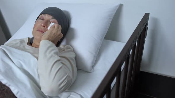 Physician Supporting Terminally Ill Female Patient Wiping Tears in Sickbed, Care alt