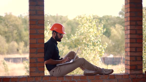 Developer Builder Contractor Specialist Read Plan Scheme. Designer On Construction Site. Architect. alt