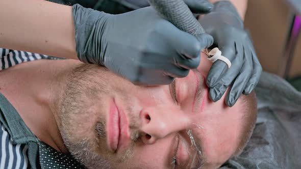 Master Beautician Does Eyebrow Tattoo