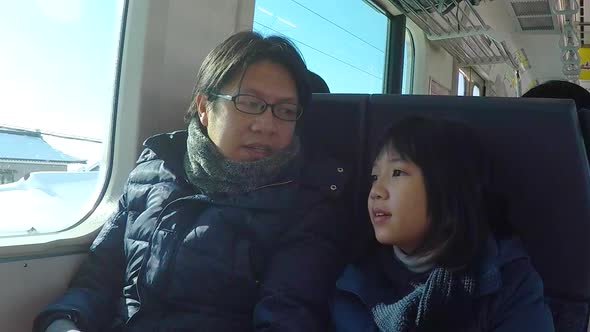 Asian Father And Daughter Travel By Train, Stock Footage | VideoHive