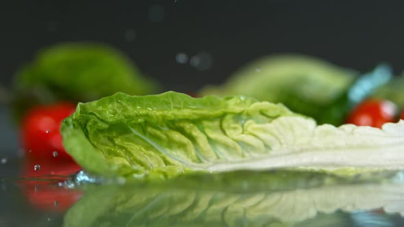 Lettuce Falling to Water in Super Slow Motion Shot with High Speed Cinema Camera in   1000Fps alt