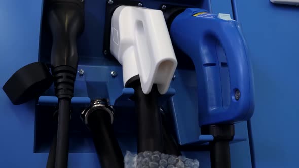 Charging an Electric Car at the Station alt