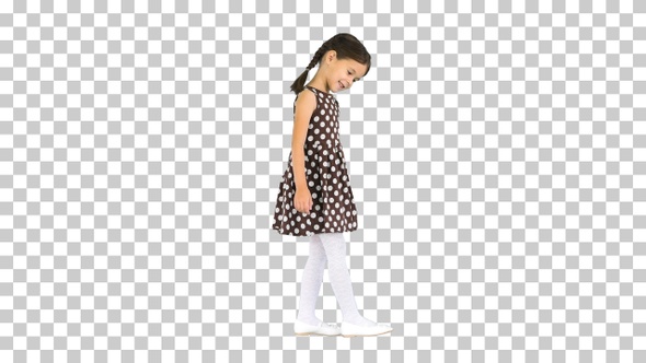 Shy little girl in polka dot dress waving, Alpha Channel alt