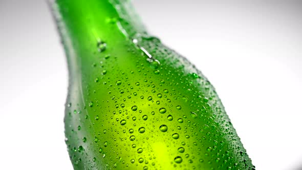 Cold Beer Bottle with Drops Rotates 360 Degrees alt